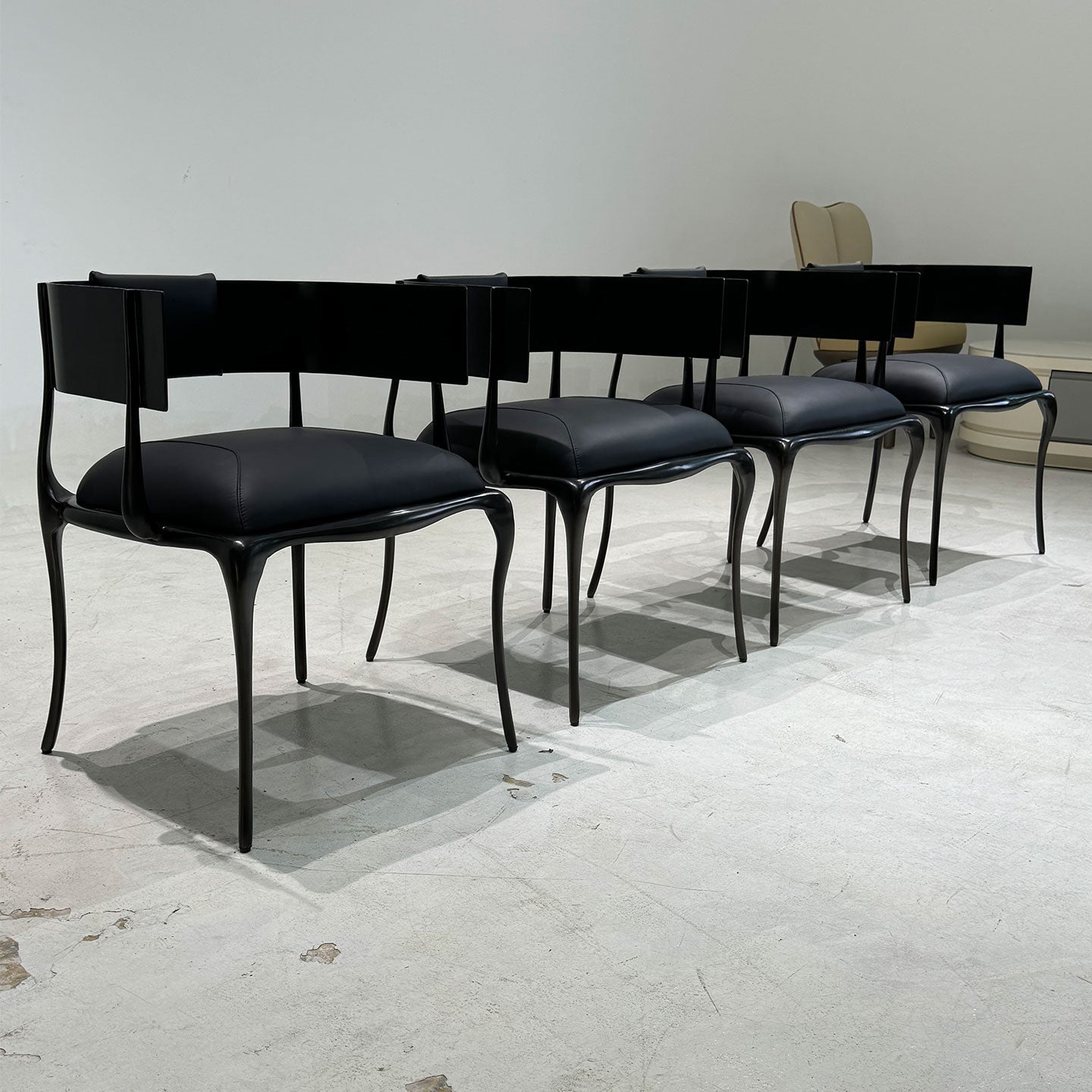 Luxury sculptural metal dining chair, handcrafted designer armchair