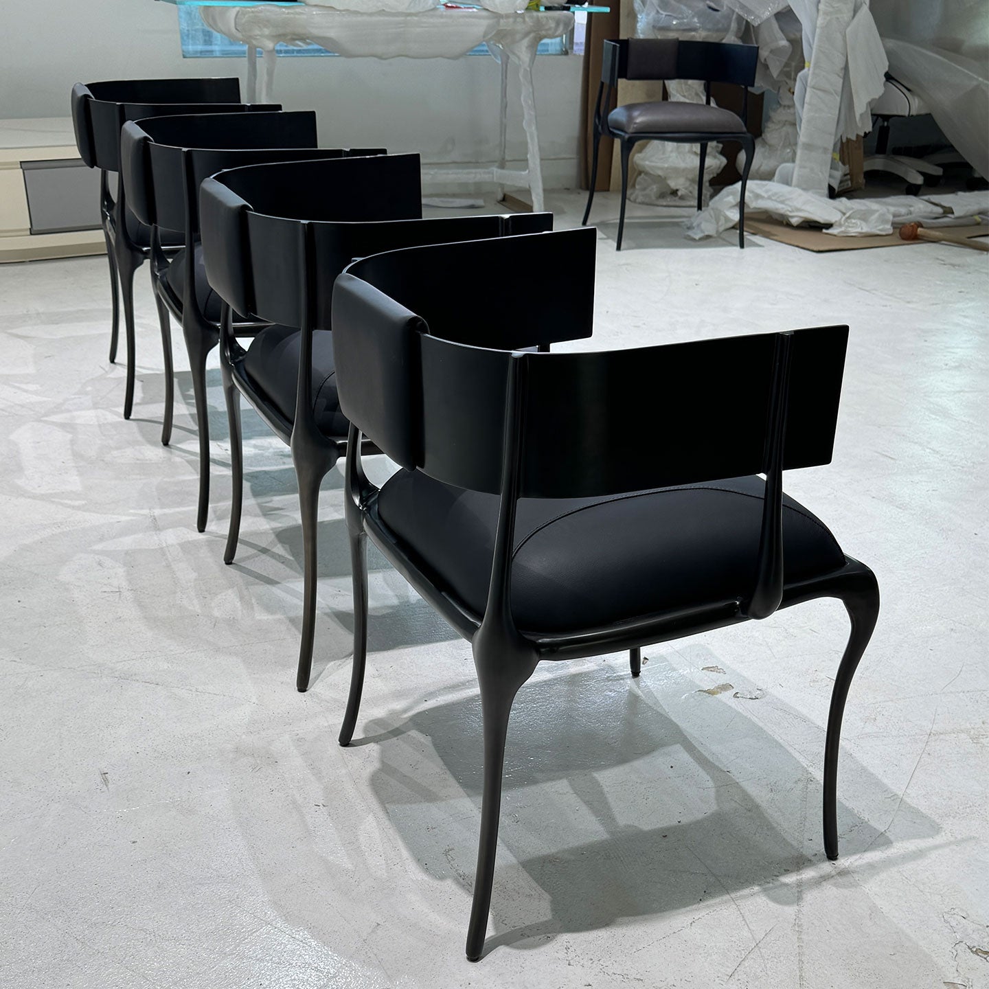 Luxury sculptural metal dining chair, handcrafted designer armchair