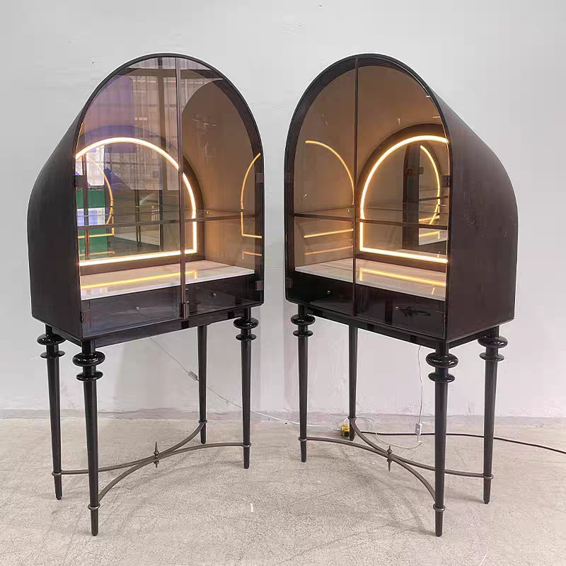Arched bar cabinet with transparent glass doors and built-in LED lights
