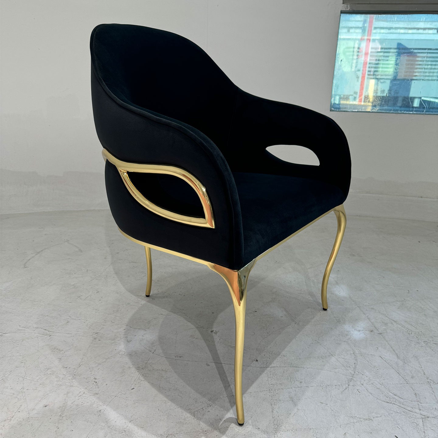 Luxury Black Velvet Armchair with Sculptural Gold Metal Frame | Modern Curve Dining Chair