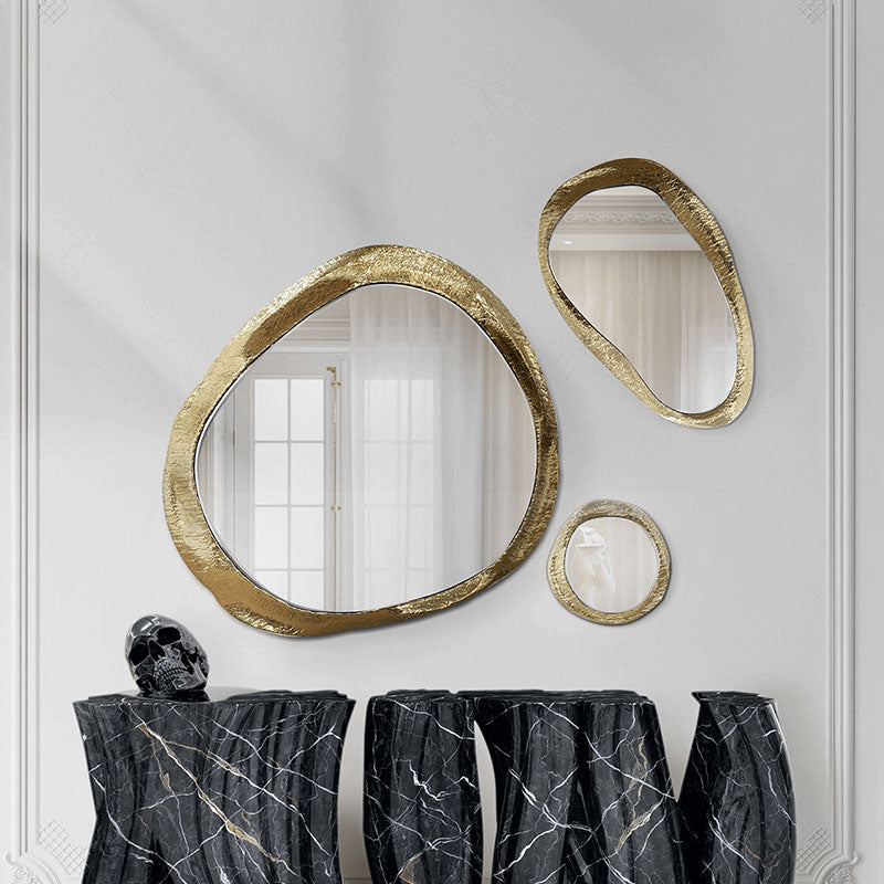 three different-size mirrors