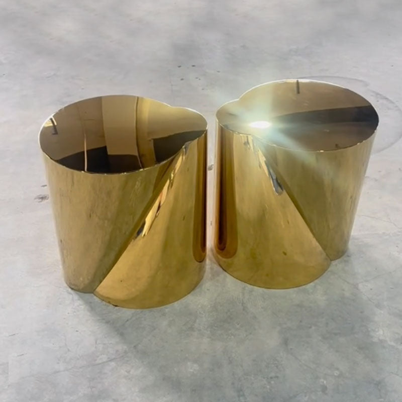 Polished stainless steel sofa side table
